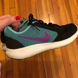Women’s Teal and purple Nike Revolution size 8